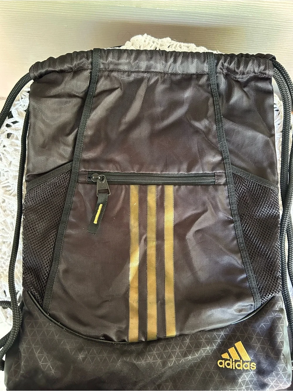 adidas Men’s Black Drawstring Backpack with Gold Stripes